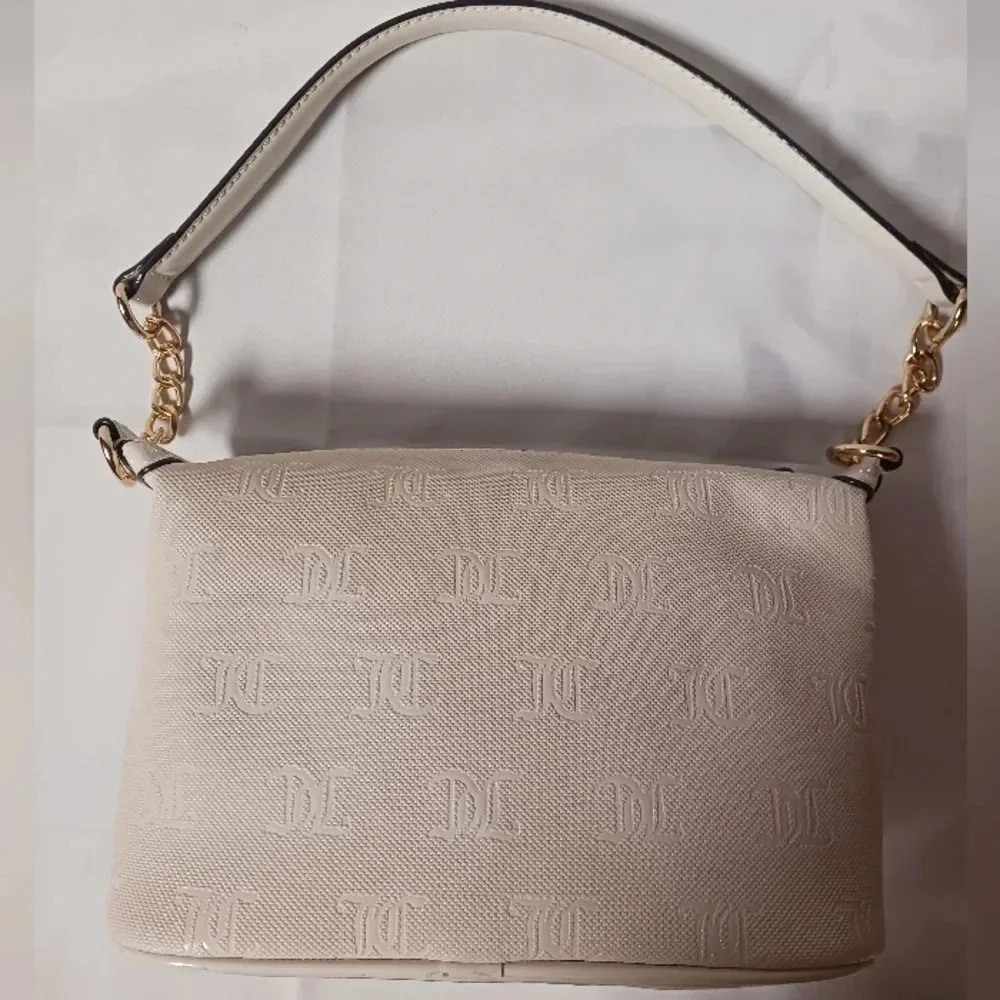 NWT Juicy Couture cream purse **